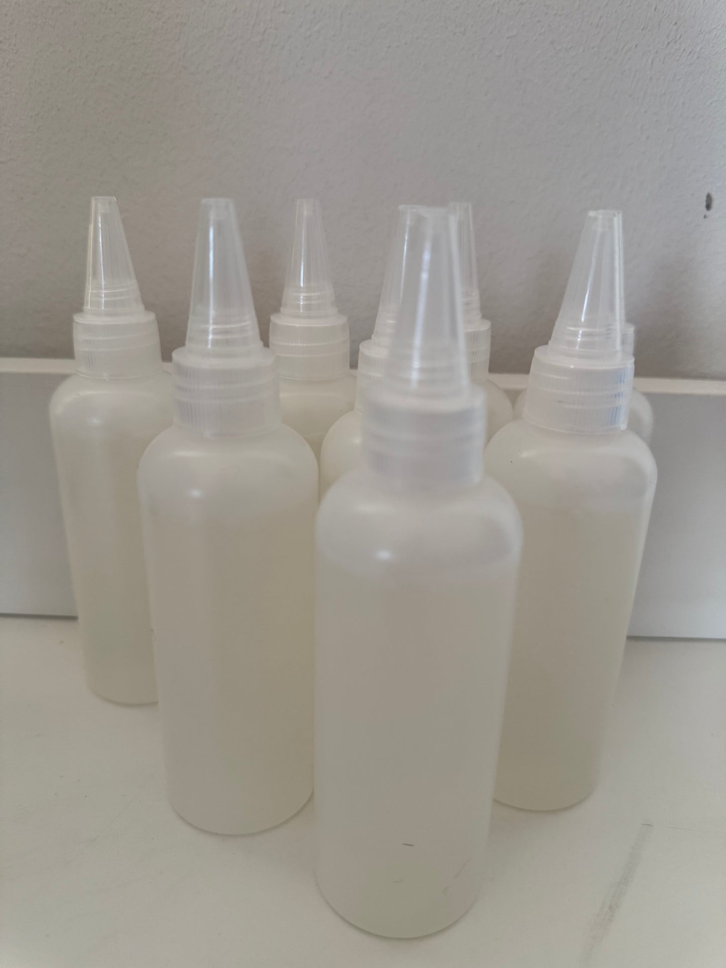 Colle pour scellement des cheveux injectés sur micro-peau